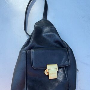 WOMENS Tingello Black Leather sling handbag with 4 pockets & adjustable strap